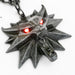 productImage-21982-the-witcher-3-wild-hunt-wolf-medaillon-mit-led-augen-3.jpg